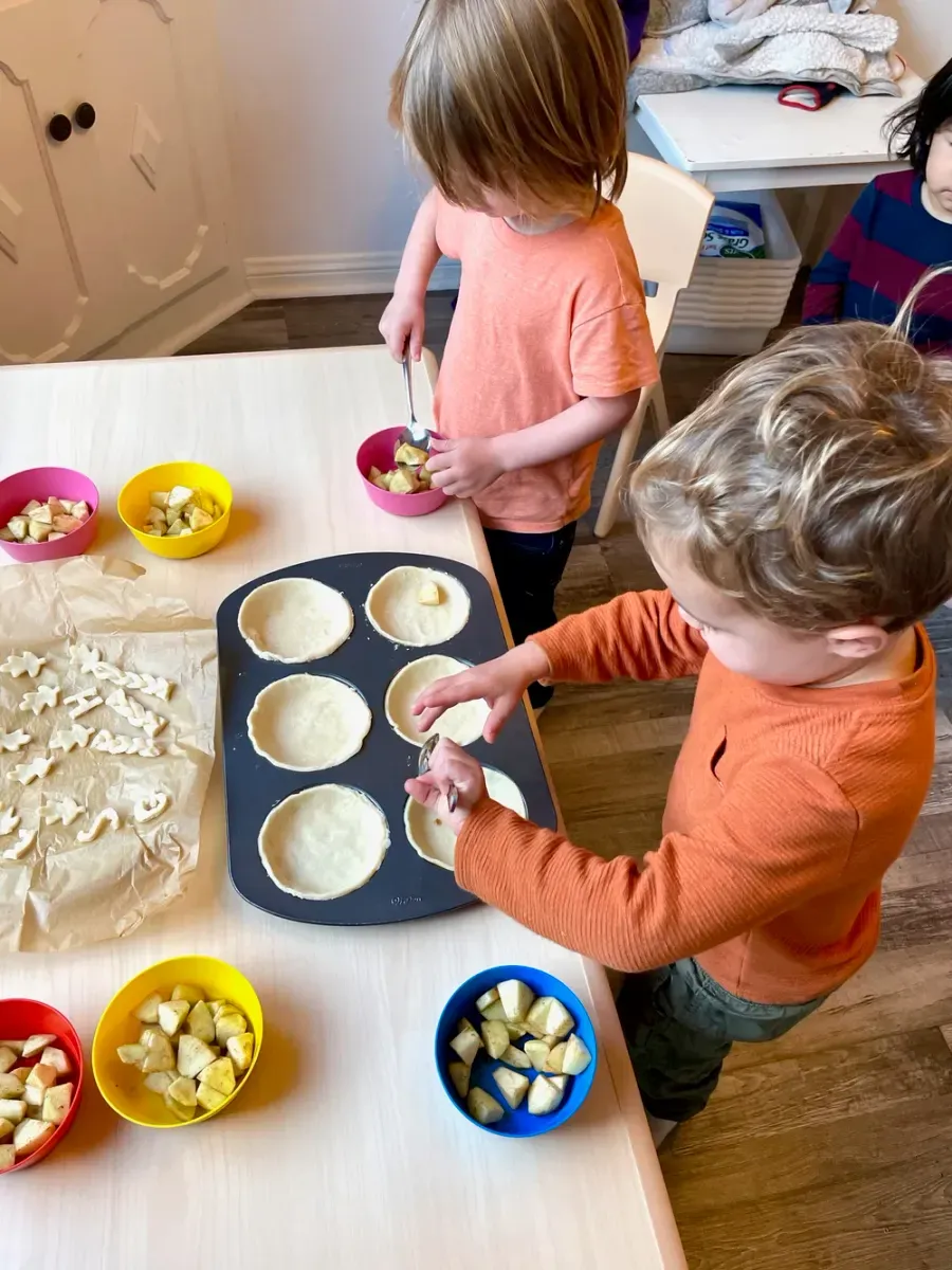Children helping bake in the kitchen